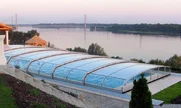 Zastrešenie bazéna OCEANIC - nízky od výrobcu kvalitných krytov na bazén Alukov Zastrešenie bazéna OCEANIC - nízky od výrobcu kvalitných krytov na bazén Alukov